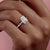 Emerald Cut Moissanite Shoulder Set Ring With Hidden Halo